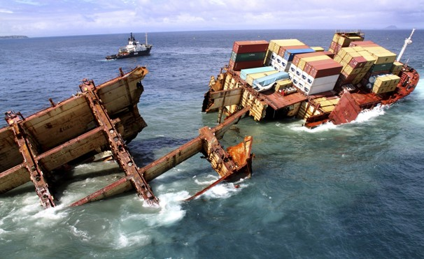 In this photo provided by Maritime New Zealand, half of the cargo ship Rena sinks on a reef near Tauranga, New Zealand, Tuesday, 10 January 2012. The 774-foot (236-meter) vessel split in two over the weekend amid heavy seas and now the stern section is slipping from the Astrolabe reef and sinking. AP Photo / Maritime New Zealand, Graeme Brown