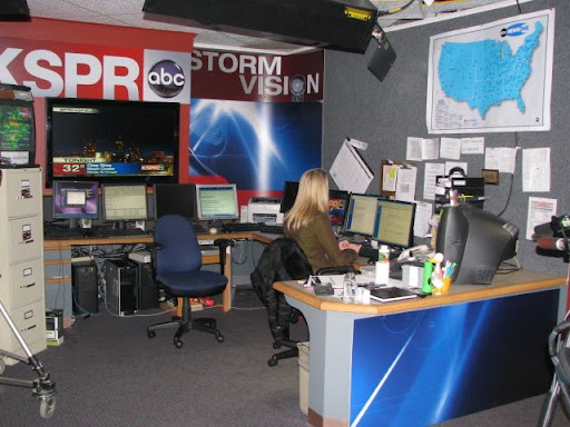 Natalie Nunn of KSPR's Storm Vision Team checks the latest weather conditions.