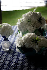 Some tables had a grouping of flowers. Some tables had a grouping of flowers.