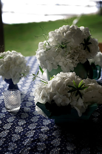 Some tables had a grouping of flowers. Some tables had a grouping of flowers.