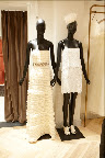 A ruffly dress with sparkly belt for your wedding day and a sequin white dress for a party or after your ceremony. A ruffly dress with sparkly belt for your wedding day and a sequin white dress for a party or after your ceremony.