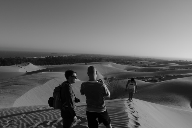 Tourists enjoying the Mui Ne Red Sand Dunes Tourists enjoying the Mui Ne Red Sand Dunes