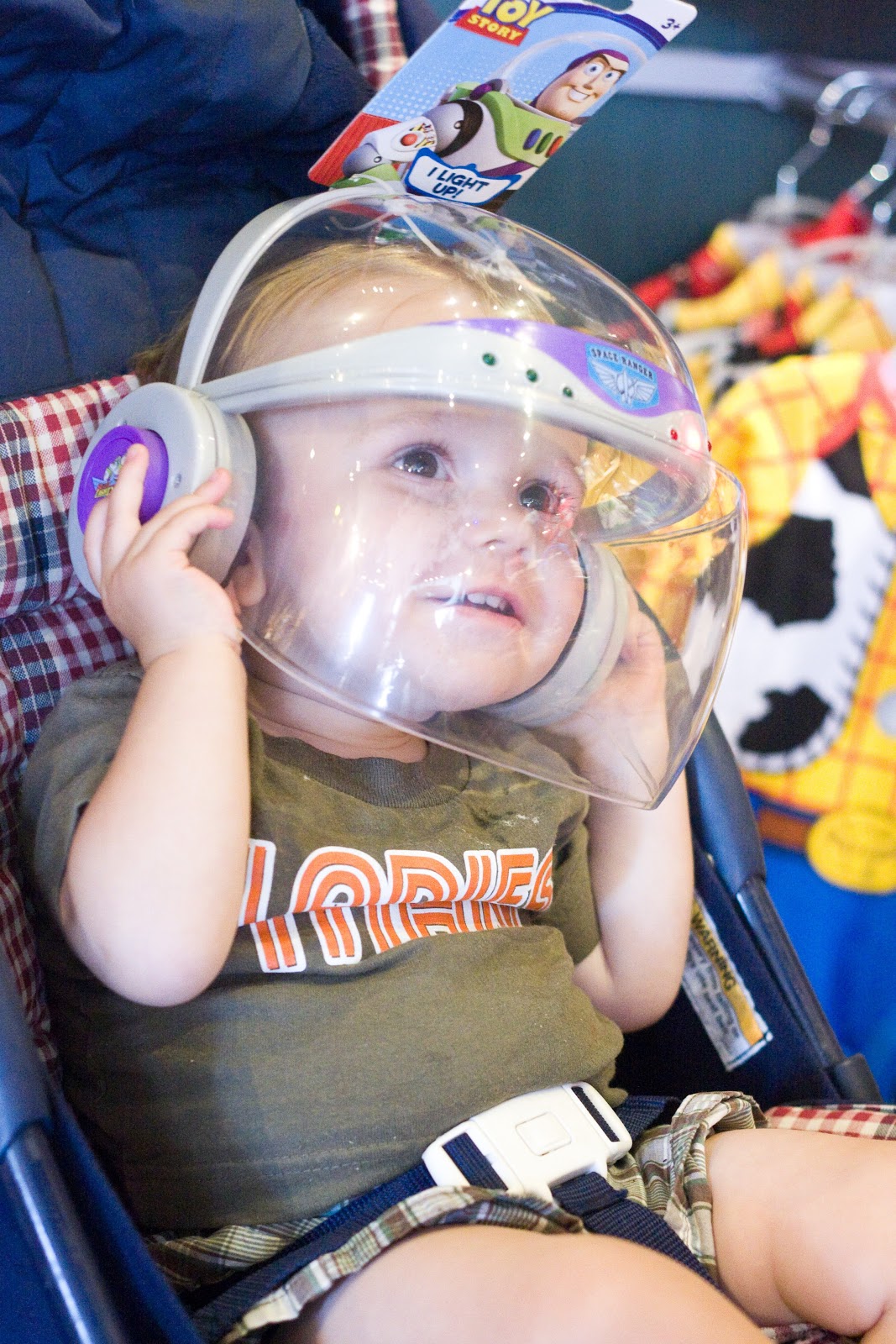 [9.6.12%2520-%2520disney%2520jacob%2520try%2520on%2520buzz%2520helmet%255B3%255D.jpg]