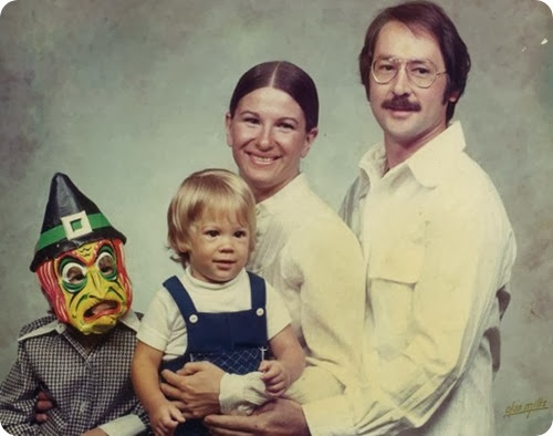 family with masked baby