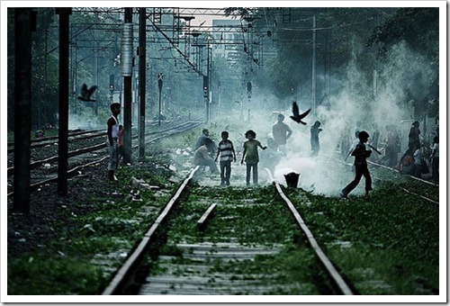 Children Playing on Railway Track