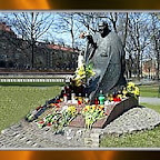 poland -krakow flowers were laid at official statues of pope john paul ii across poland.jpg