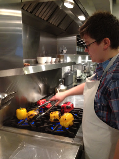 RD, my trusted shoot assistant, roasting the peppers