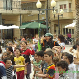 Verbena.Niños en plena faena