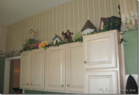 Maple cabinets, bird houses, green walls, 