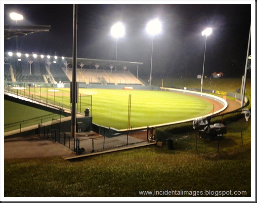 I live about 90 minutes drive from Williamsport, PA, the home of the annual Little League World Series.  I try to take my boys up for at least one day of the series each year.  This is Howard J. Lamade Stadium about 30 minutes after the final evening game on Friday, August 17.  I was struck by the emptiness and the pristine condition so soon after a game.  This picture is my attempt to capture the lonely beauty of the empty stadium.