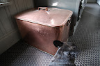 Wow, Sharkey, I've never really spent any time looking at all of this copper.  It's great!  Take a look at this large copper storage bin next to the Aga stove!