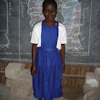 021 - AMOUZOUVI YAWA, 8ans, CEI, Du CPI au CEI, orpheline de Père, vit avec sa maman sans travail