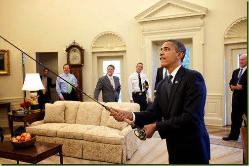 President Barack Obama tries out the fly fishing rod given to him on his birthday by a group of avid fisherman on his staff, August 4, 2009. (Official White House Photo by Pete Souza)<p>This official White House photograph is being made available only for publication by news organizations and/or for personal use printing by the subject(s) of the photograph. The photograph may not be manipulated in any way and may not be used in commercial or political materials, advertisements, emails, products, promotions that in any way suggests approval or endorsement of the President, the First Family, or the White House. 
