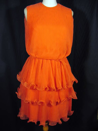 A dress designed by Mr. Du Puis.