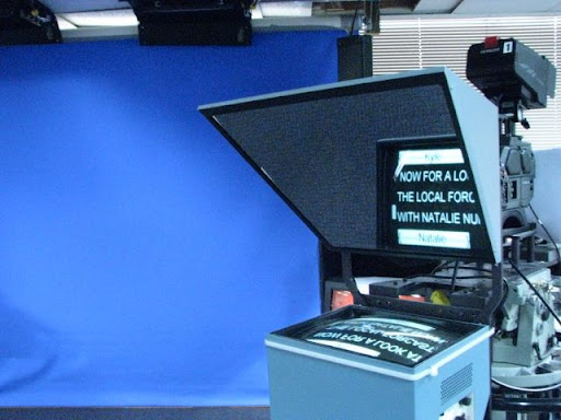 A teleprompter provides a script for the news anchor to read in the studio.