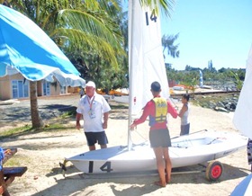 Coach Geoff Mikey preparing boat