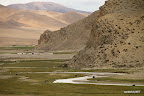 Green valleys among arid mountains
