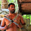 Tjupakai Guide Running Water Explains The Boomerang - Oak Beach, Australia