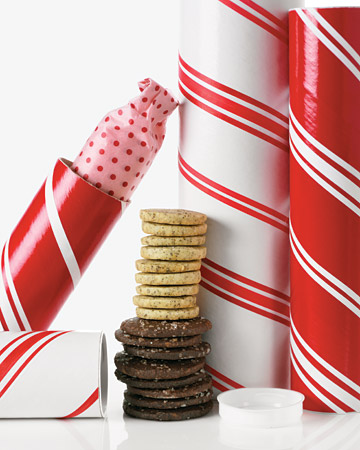 Using a long mailing tube is a fabulous way to stack cookies without worrying that they will break. Here the tube is wrapped with a Christmas paper, but you can customize your own with whatever design or pattern you woud like.