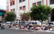 A strike by garbage collectors and street cleaner has left Sana'a buried in trash for over two week. People have resorted to dumping trash in the center divide outside Al Kumaim Center on Hadda street, Sana'a, Yemen