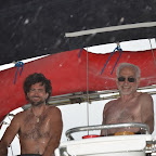 Segeln bei Regen macht auch Spass, die Herren lachen noch