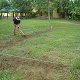 Chris and I were charged with leveling out the area where plaground would sit.