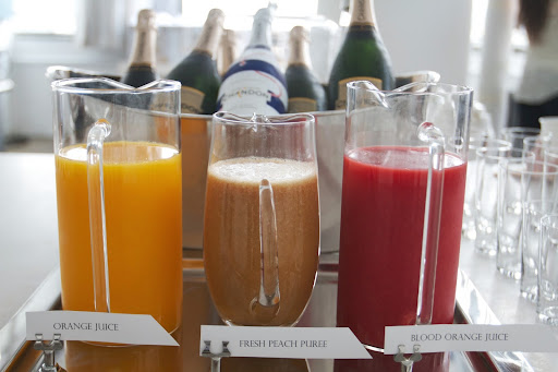 DIY Mimosa Bar: Freshly squeezed juice for breakfast mimosas. Guests chose their own combination and even combined juices DIY Mimosa Bar: Freshly squeezed juice for breakfast mimosas. Guests chose their own combination and even combined juices