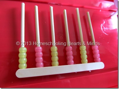 step 6 for making your own abacus @Homeschooling Hearts & Minds