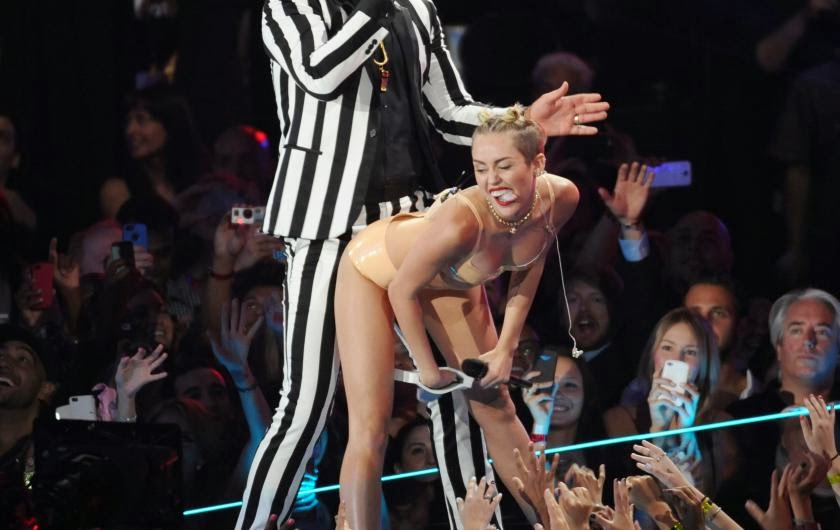 Miley cyrus getting fucked by a girl