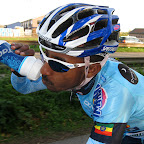 Ethiopian rider on Marco Polo Cycling Donckers Koffie, Alem racing in Europe, with team bidon by Tacx wearing the 2012 kit from CCN Sportswear and helmet from Specialized.. (photo: Remko Kramer)