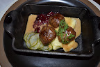 Helga's Meatlballs with Mashed Potatoes and Lingonberries and Pickles on the side. Helga's Meatlballs with Mashed Potatoes and Lingonberries and Pickles on the side.