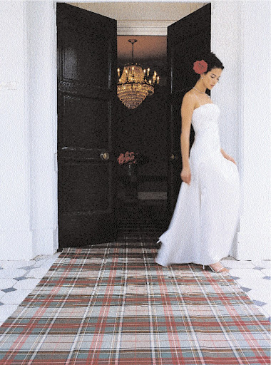 The tartan carpet used in this photograph adds unmistakable tradition and beauty to this ceremony.