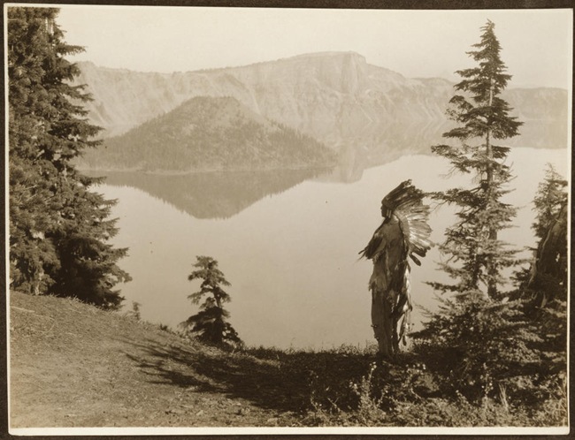 Title: The chief--Klamath.
Date Created/Published: c1923.
Summary: Photograph shows Klamath Indian chief in ceremonial headdress standing on hill overlooking lake, California or Oregon.
Photograph by Edward S. Curtis, Curtis (Edward S.) Collection, Library of Congress Prints and Photographs Division Washington, D.C. Title: The chief--Klamath.
Date Created/Published: c1923.
Summary: Photograph shows Klamath Indian chief in ceremonial headdress standing on hill overlooking lake, California or Oregon.
Photograph by Edward S. Curtis, Curtis (Edward S.) Collection, Library of Congress Prints and Photographs Division Washington, D.C.