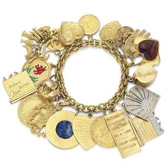 A Charm Bracelet, with 20 assorted charms.
Estimate: $25,000-$35,000