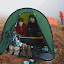 Cooking breakfast in the cold morning mist at Ranukumbolo campsite