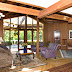 Looking at the formal living room and dining room. The photo was taken from the television area.