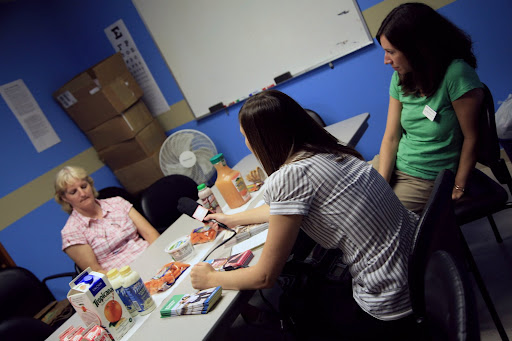 KSMU's Kristian Kriner interviews Sue, a Smoking Cessation group member. 

Photo Credit: Alex Crowder