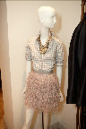 A great button down top with a fun and flirty feather skirt. And don't forget the accessories, check out the necklaces...we love them! A great button down top with a fun and flirty feather skirt. And don't forget the accessories, check out the necklaces...we love them!