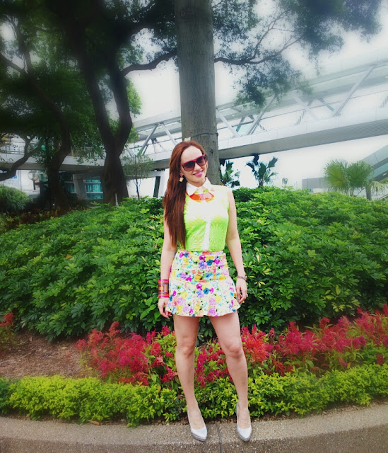 Neon Shirt, Floral Skirt, Plastic Neckpiece