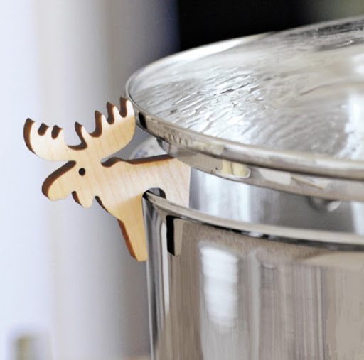 Last and littlest, but not least: I want Santa to please stuff this wooden cut-out moose in my stocking. Just perch him on the rim of a pot so steam can vent and say good-bye to overflows! (Little Pot Guard Critters, $7 each, http://www.solutions.com/)