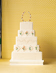 This cake served as the main inspiration. Rosma loved the piped details, square shape, and the diamonds on the alternating tiers. This cake served as the main inspiration. Rosma loved the piped details, square shape, and the diamonds on the alternating tiers.