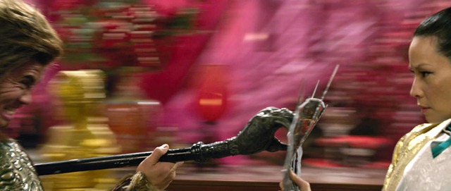 Bronze Lion (CUNG LE) attacks Madam Blossom (LUCY LIU) in "The Man With the Iron Fists", an action-adventure inspired by kung-fu classics as interpreted by Quentin Tarantino's longtime collaborators RZA and Eli Roth. Making his debut as a big-screen director and leading man, RZA--alongside a stellar international cast led by Russell Crowe and Liu--tells the epic story of warriors, assassins and a lone outsider hero in nineteenth-century China who must unite to destroy the clan traitor who would destroy them all.