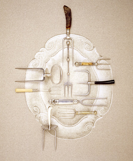 Larger than carving forks, these utensils are meant to lift roasts and other heavy meats, and to steady them while you carve. They were usually sold separately from carving sets.