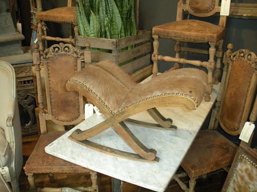 I love the rustic simplicity of wood, leather and fur. This is such a unique piece!