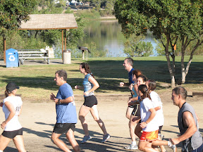 Susan and John race with the pack