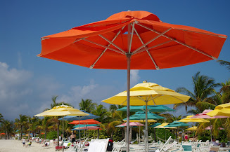 It's pretty to look up and down the beach and see the different colored umbrellas.