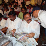 Karne Prabhaker, TRS memeber and visitors reviewing news paper