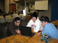 The VEX Team programming a kit-bot