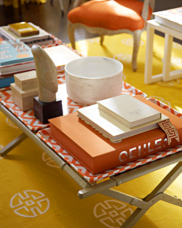 Decorating Editor Rebecca Robertson created a beautiful living space in the design studio at Martha Stewart Living. Her coffee table, pictured here, made from an old cot and several trays, is very camp-chic. (marthastewart.com) Decorating Editor Rebecca Robertson created a beautiful living space in the design studio at Martha Stewart Living. Her coffee table, pictured here, made from an old cot and several trays, is very camp-chic. (marthastewart.com)