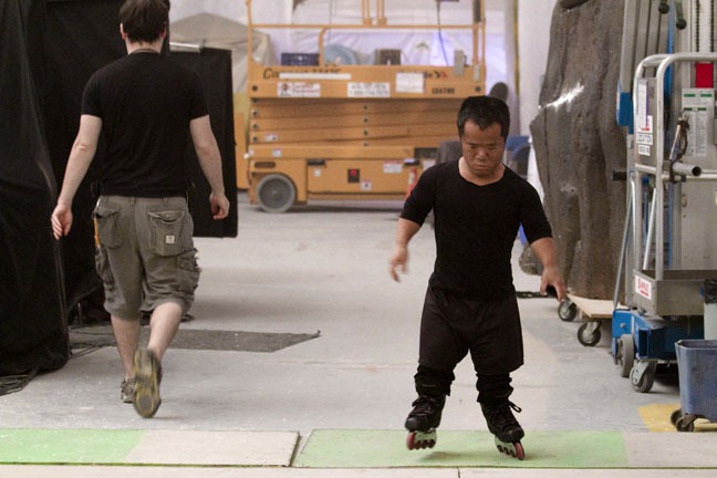 Ronald Lee Clark who plays a character named "Chuckles," rollerskates on the sound stage, "Snow White," September 12, 2011